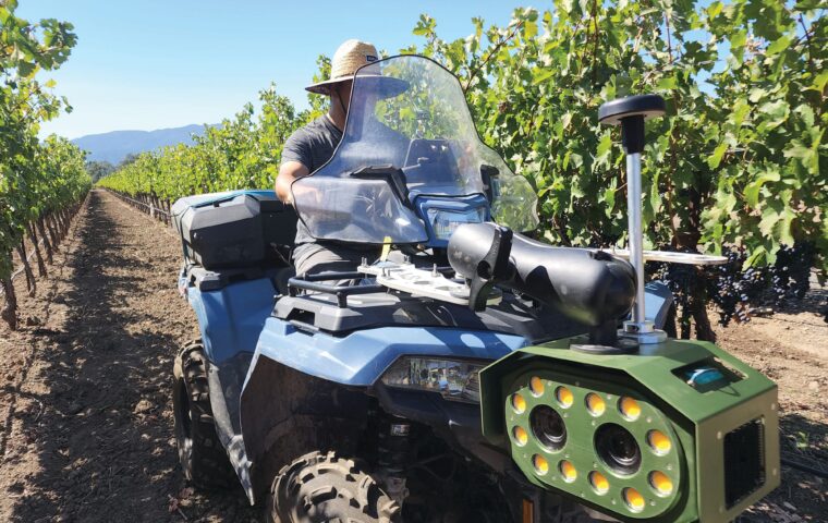 A Bloomfield Robotics camera system mounted on an ATV scans an orchard canopy in California